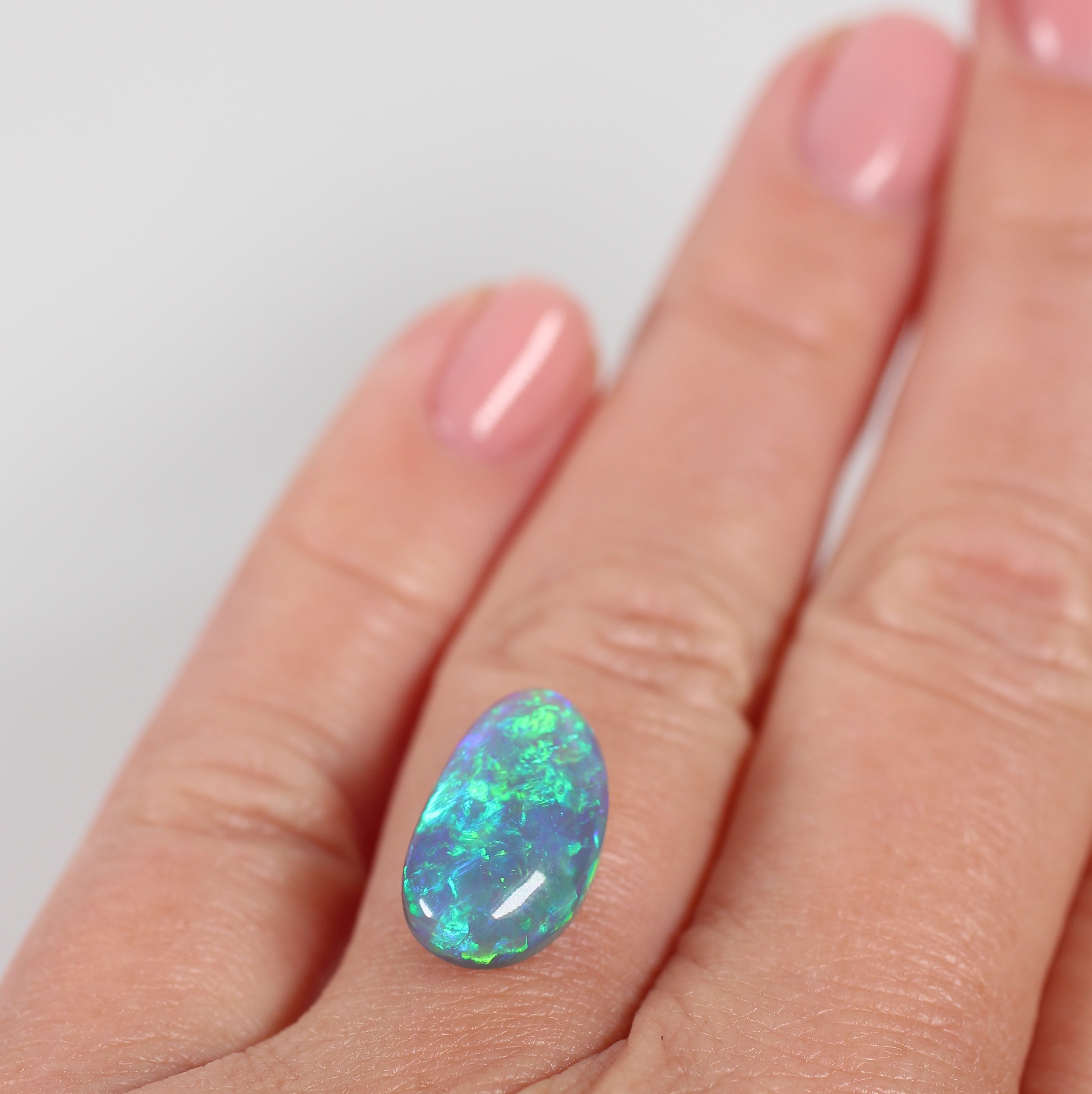 5.47ct Black Opal - 9 x 15.8 x 6.3 mm