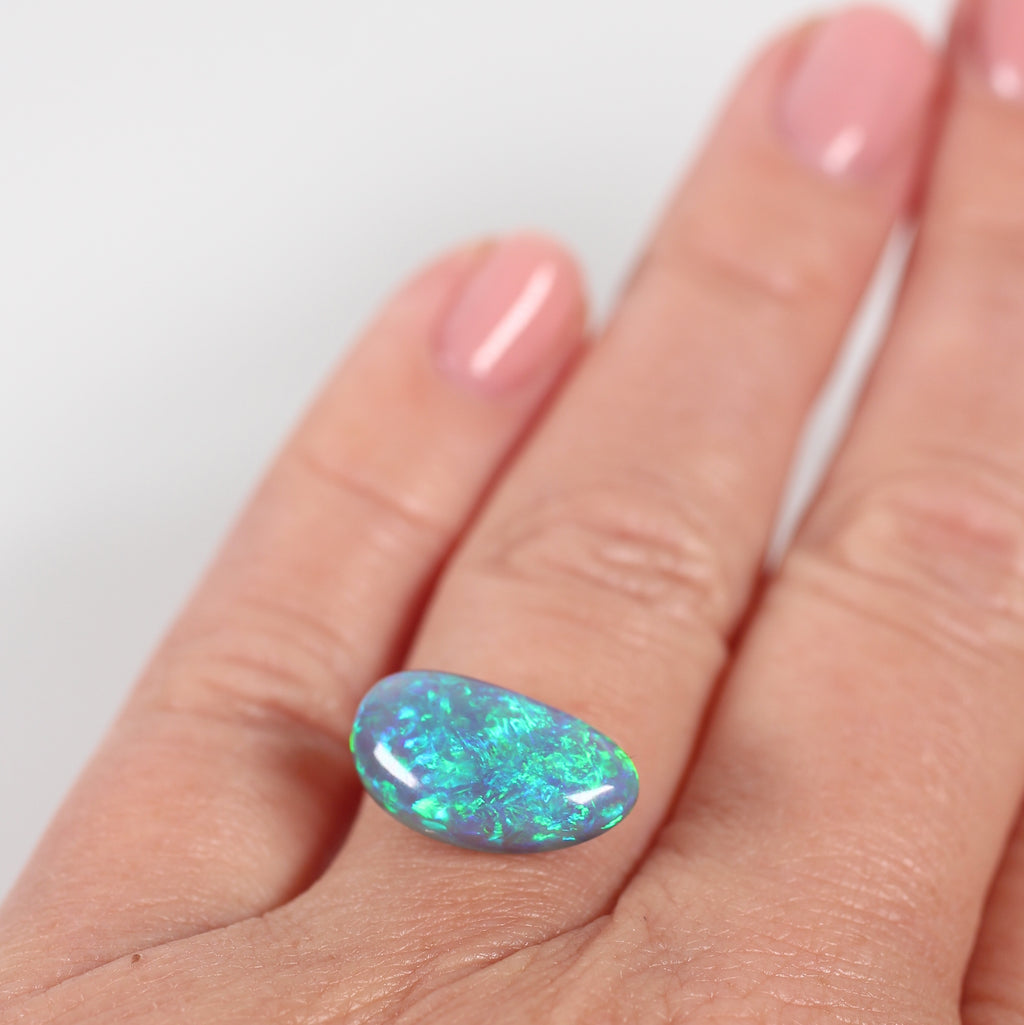 5.47ct Black Opal - 9 x 15.8 x 6.3 mm