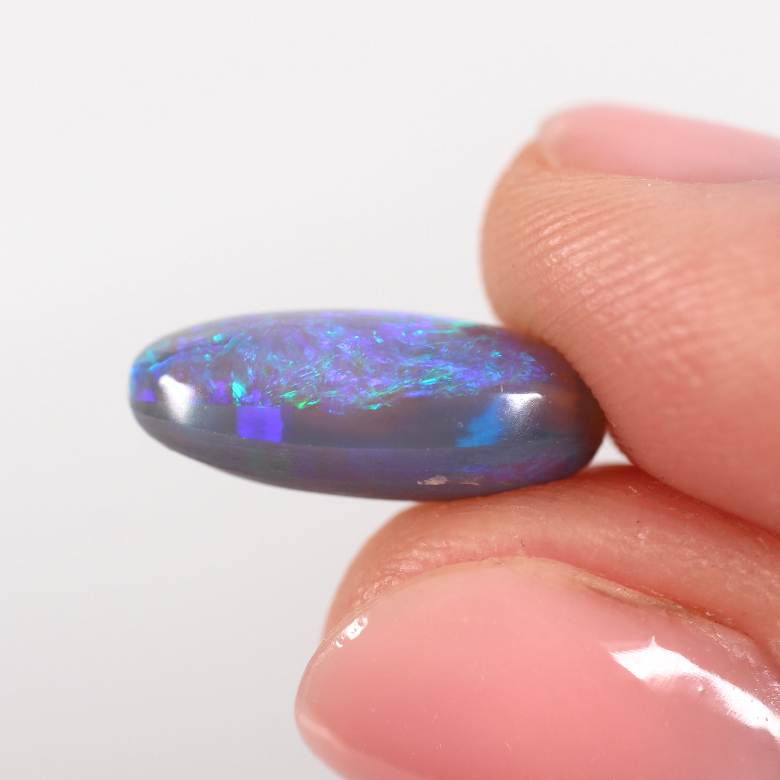 5.47ct Black Opal - 9 x 15.8 x 6.3 mm