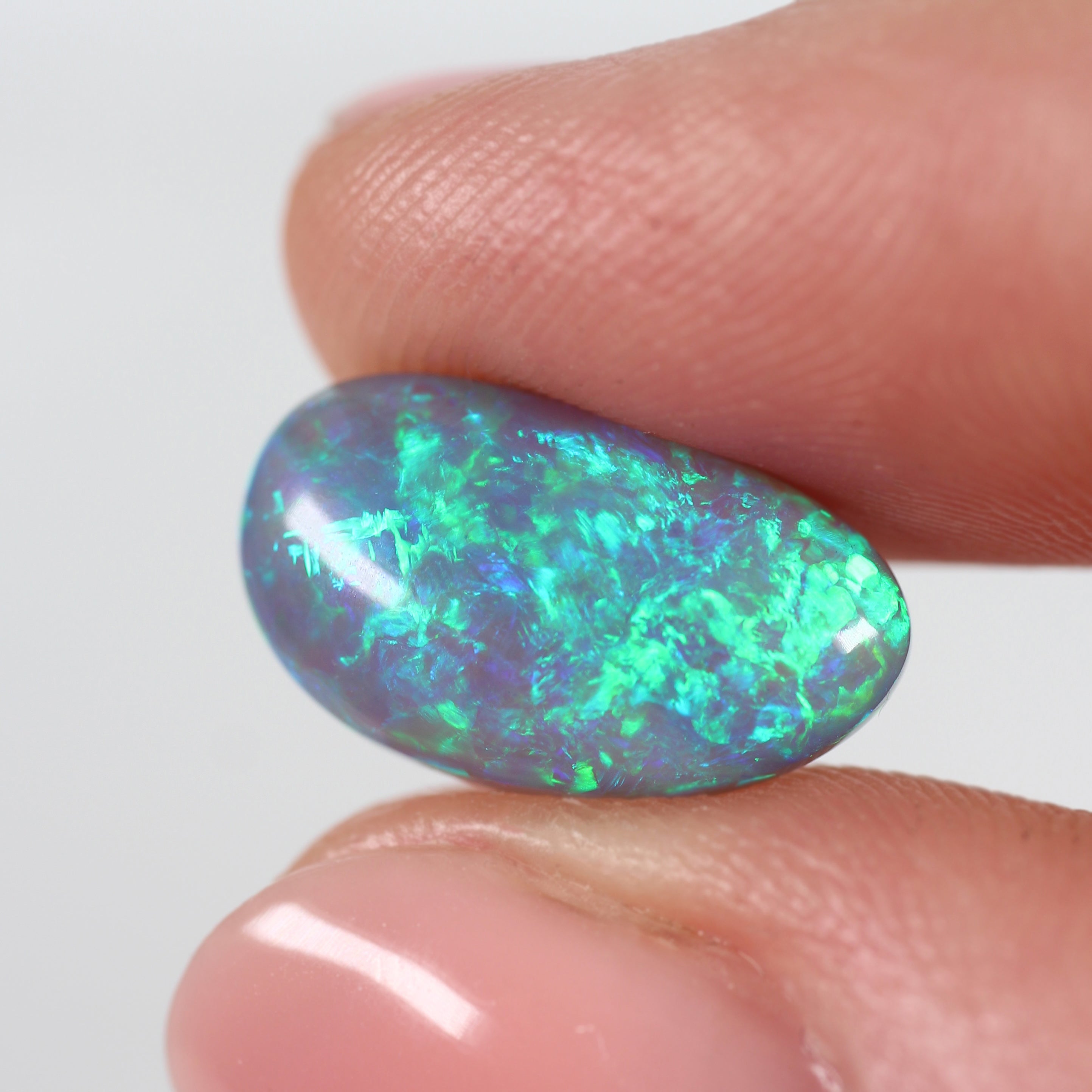 5.47ct Black Opal - 9 x 15.8 x 6.3 mm
