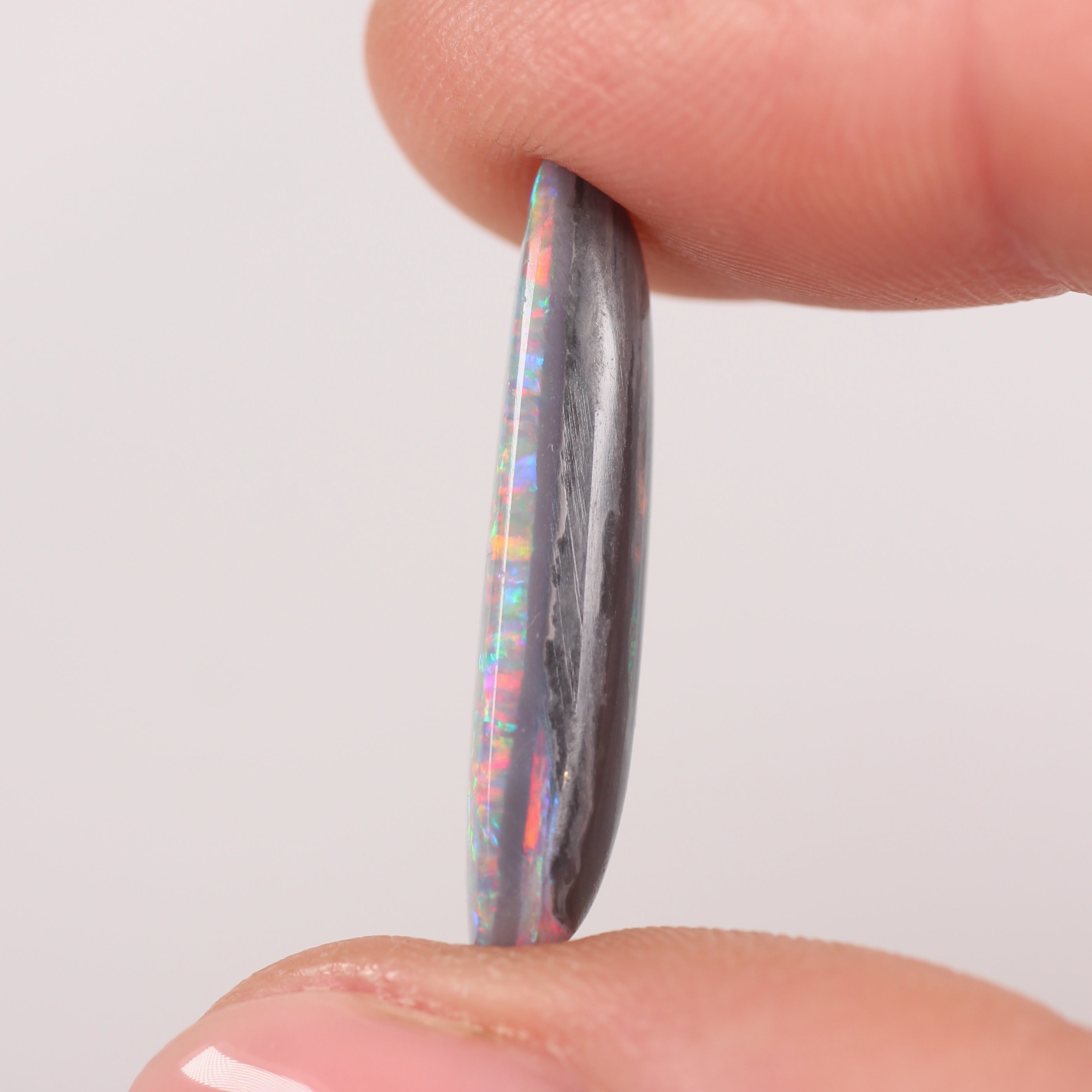 6.65 ct Black Opal - 25.5 x 7.8 x 5.2 mm