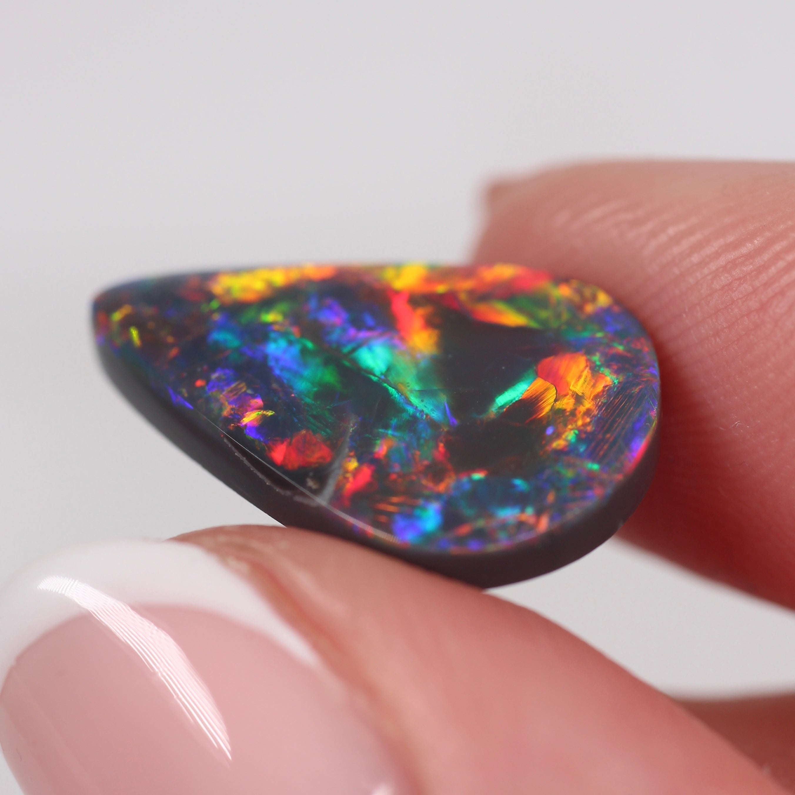 5.14ct Black Opal - 18 x 12 x 3.8mm