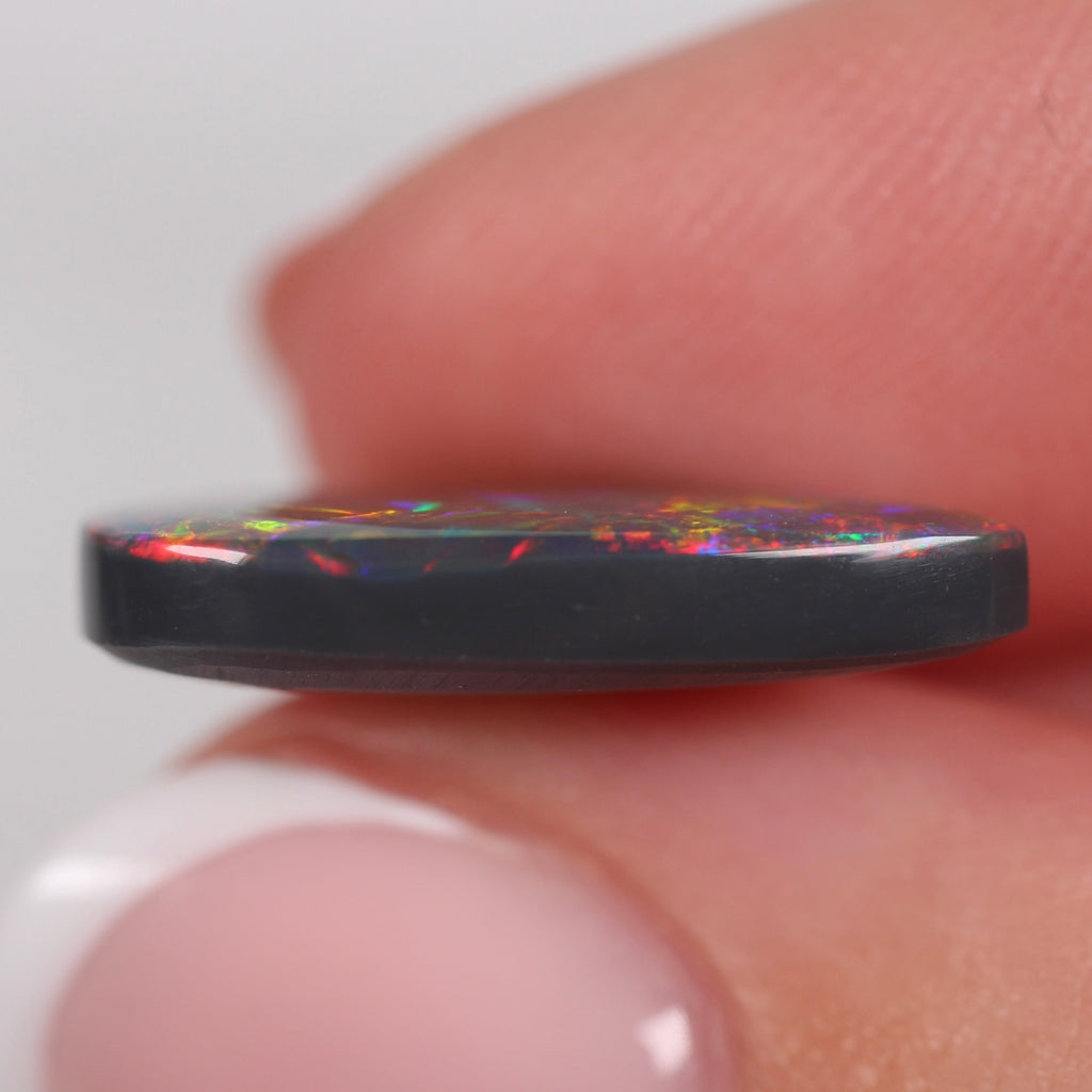 5.14ct Black Opal - 18 x 12 x 3.8mm