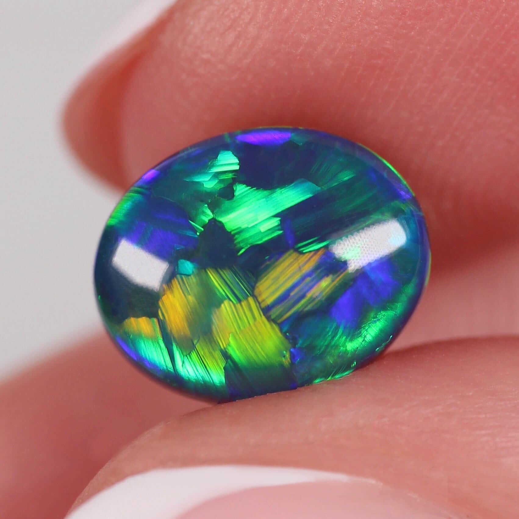 2.04ct Black Opal - 9.8 x 7.9 x 4.2mm