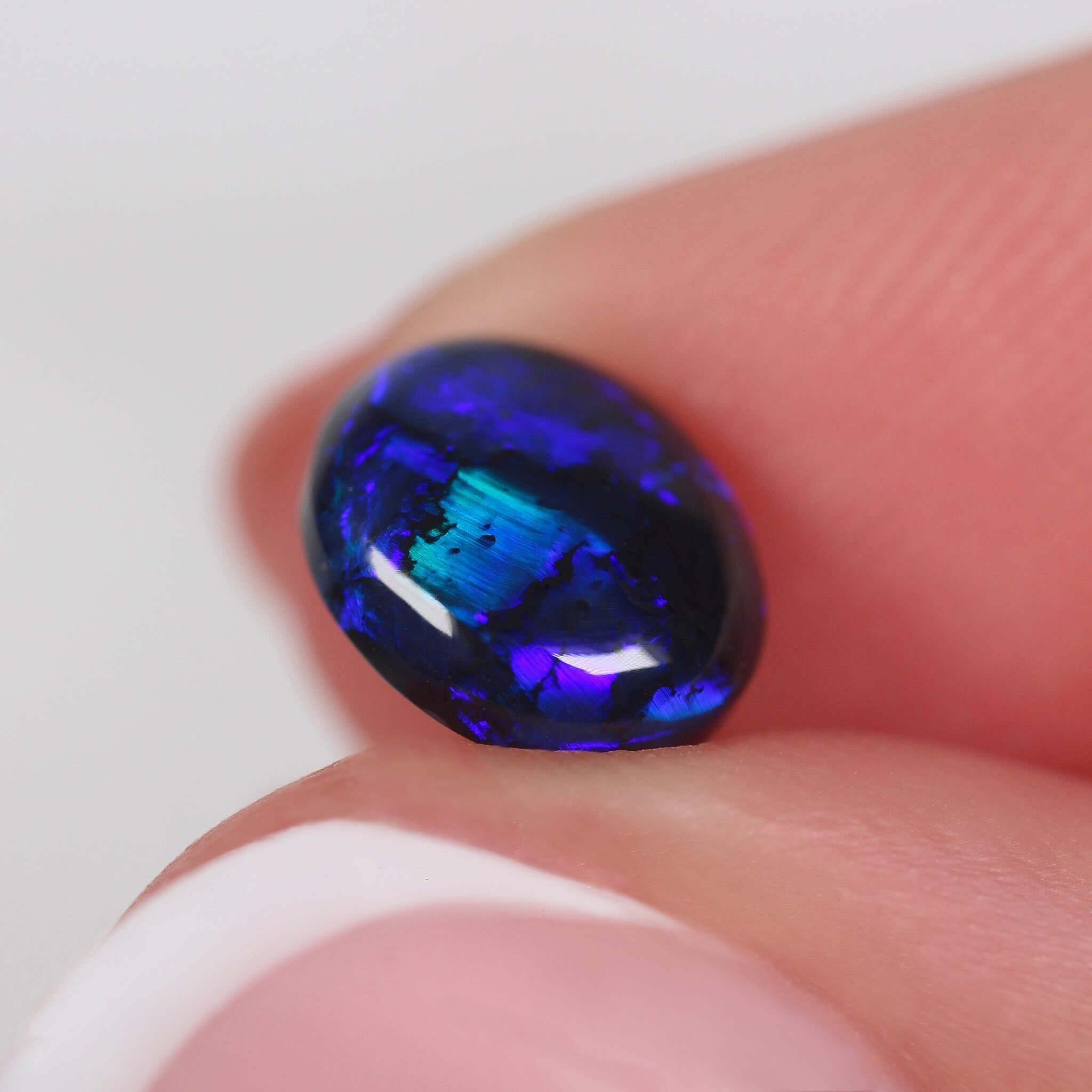 1.30ct Black Opal - 8.8 x 7.5 x 3.1mm