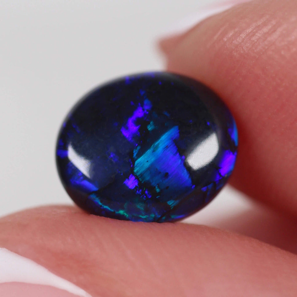 1.30ct Black Opal - 8.8 x 7.5 x 3.1mm