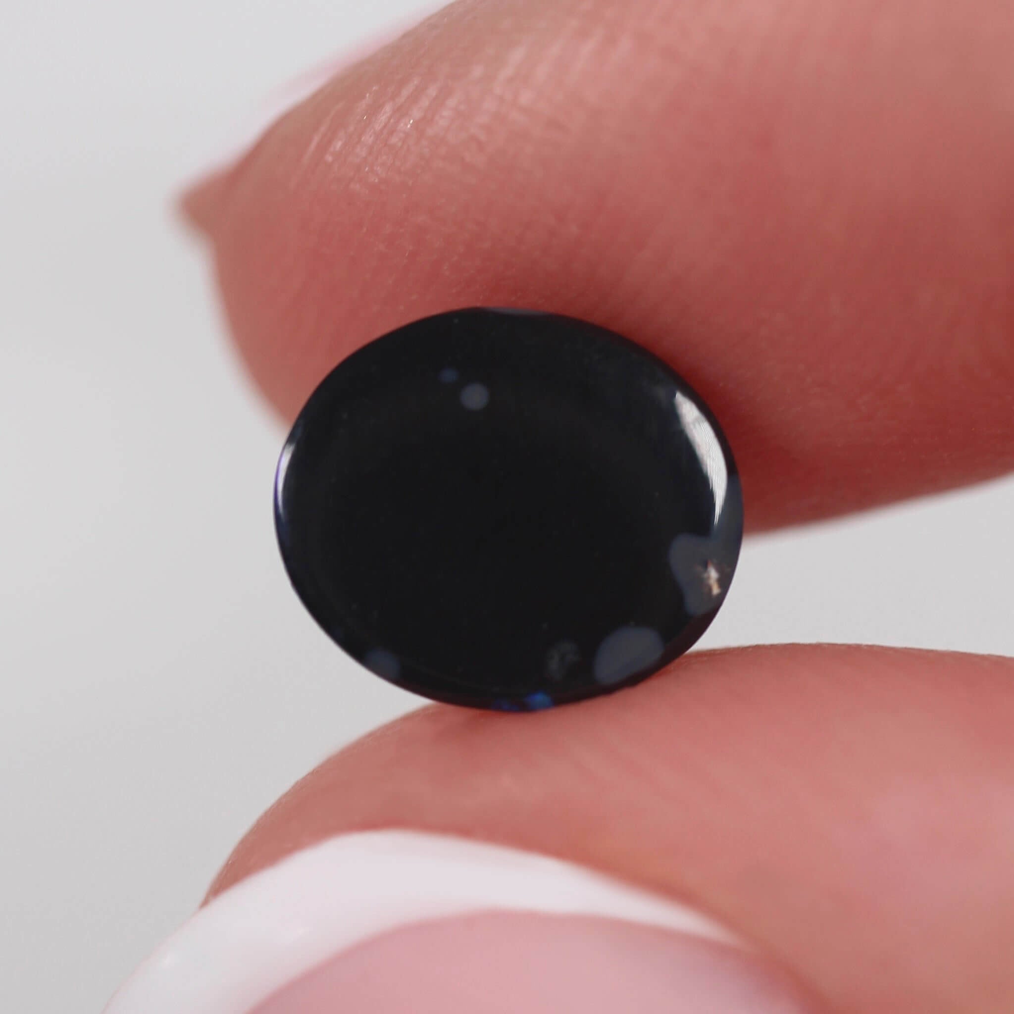 1.30ct Black Opal - 8.8 x 7.5 x 3.1mm