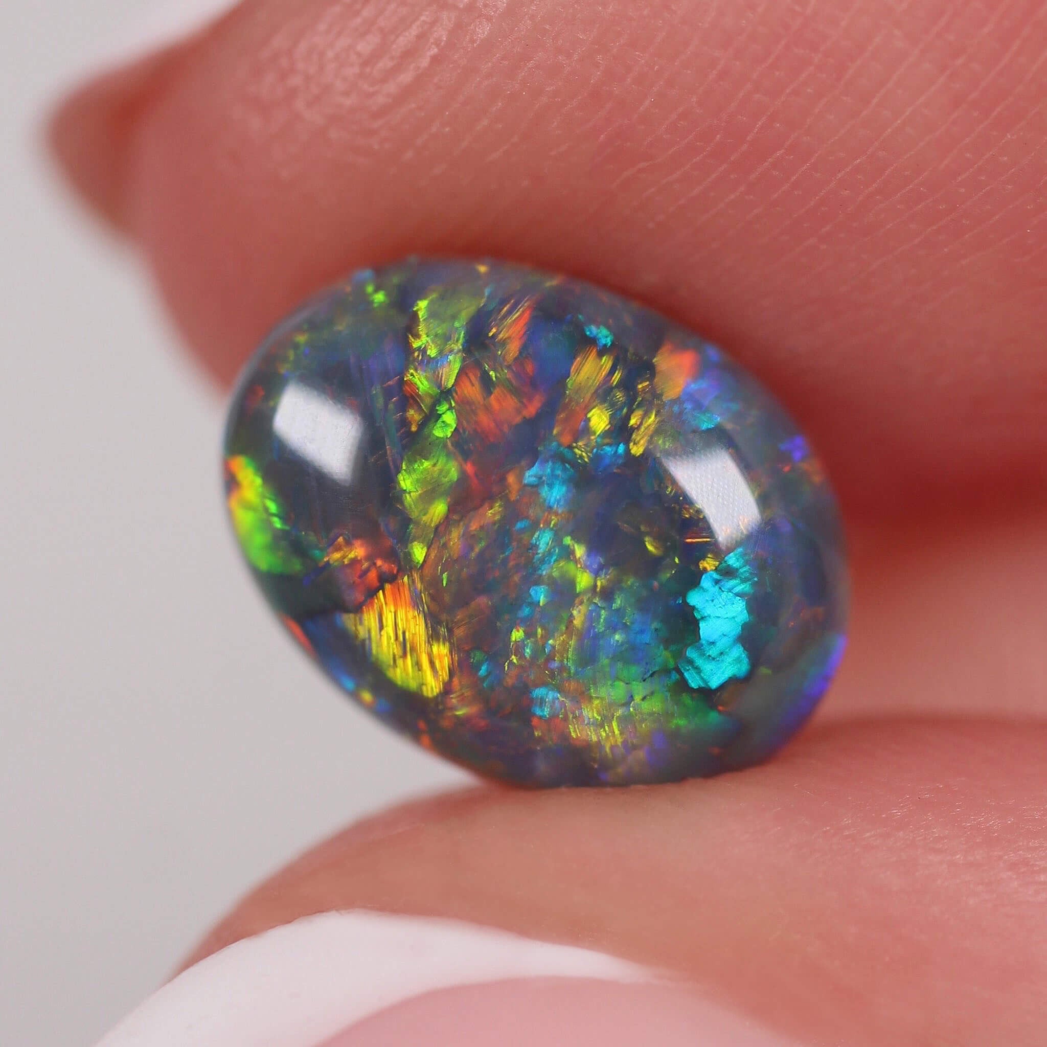 2.36ct Black Opal 10 x 7.6 x 5.2mm