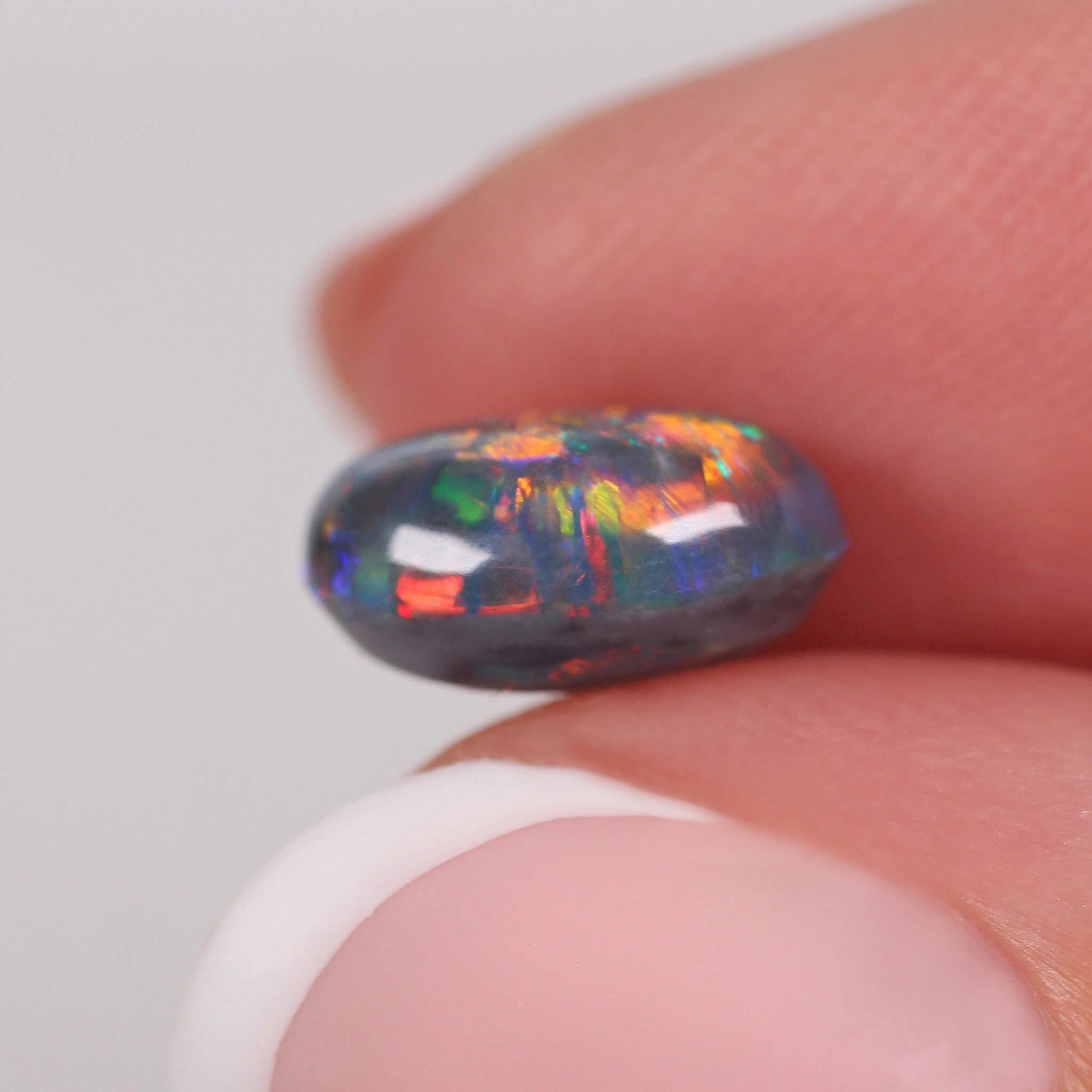 2.36ct Black Opal 10 x 7.6 x 5.2mm