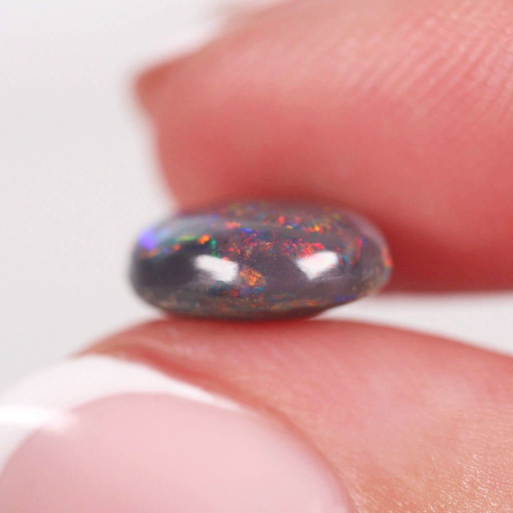 2.85ct Black Opal - 11 x 9.2 x 4.5mm