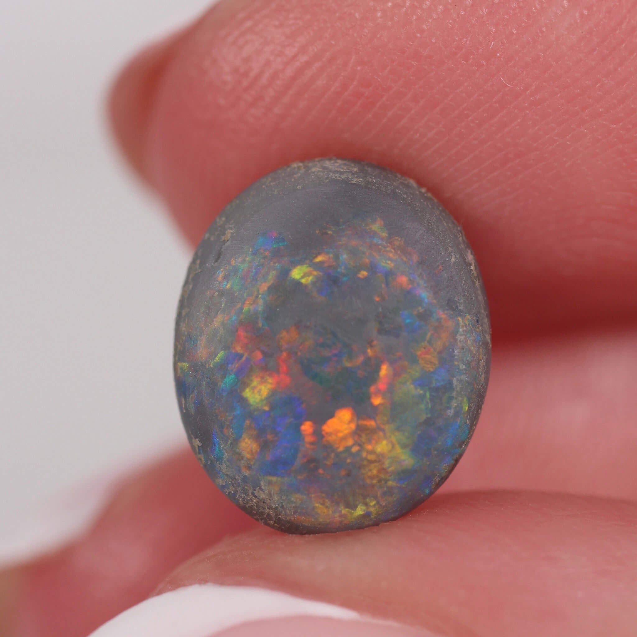 2.85ct Black Opal - 11 x 9.2 x 4.5mm