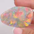 Mintabie dark opal 50ct showing rich orange-red play-of-colour
