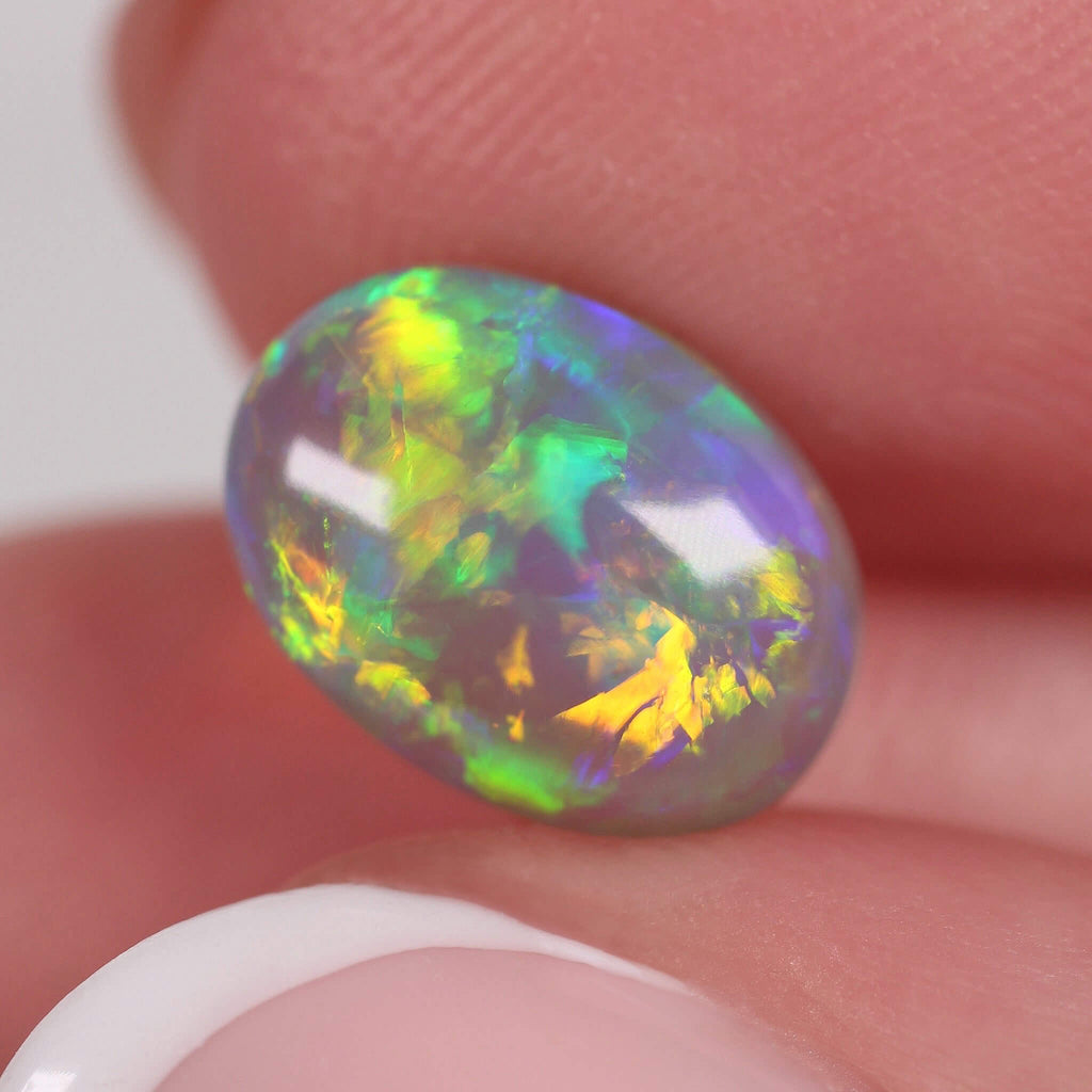 2.71ct Dark Crystal Opal - 10.7 x 7.9 x 5.5mm