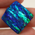 21.44ct rich blue-green boulder opal cabochon with striated pattern