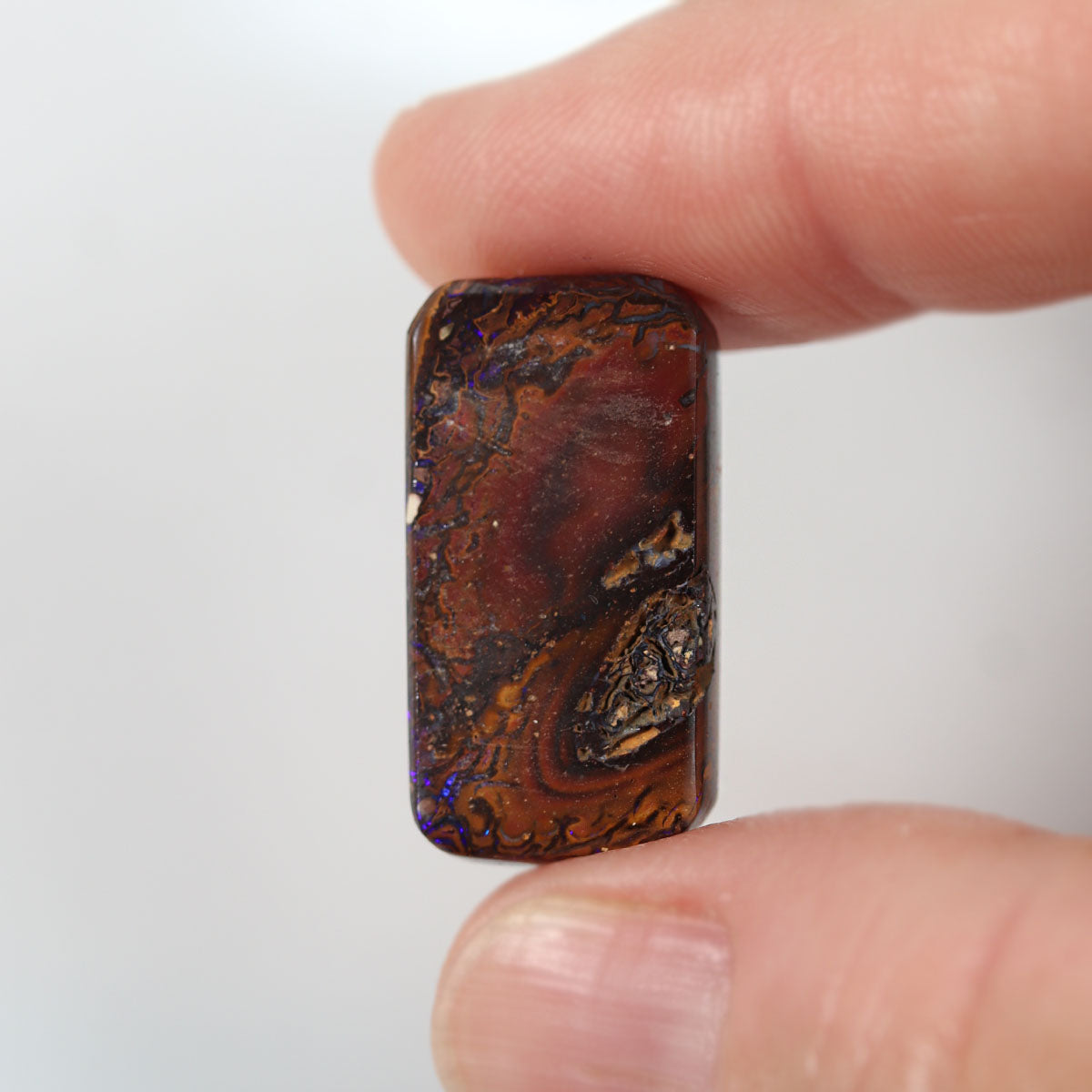 Boulder matrix from Winton held in hand to show scale