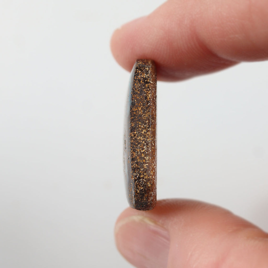 Size reference of 33.07ct boulder matrix cabochon
