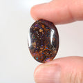 Natural boulder matrix from Winton, 13.98ct with lively blue flash