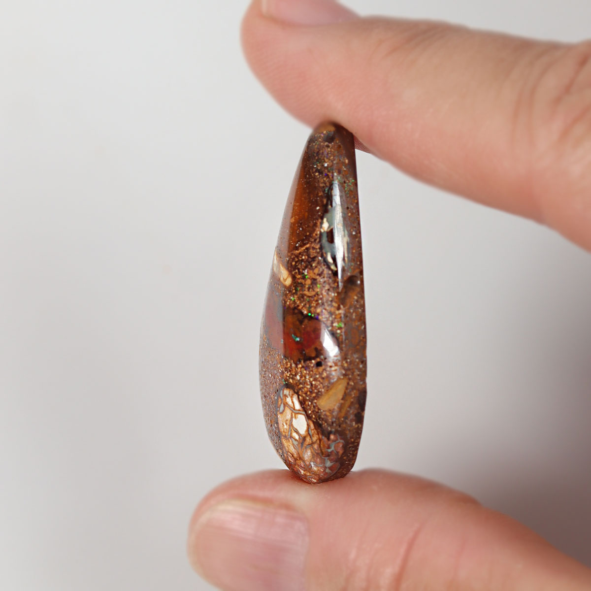 34.61ct Australian boulder matrix shown for size comparison
