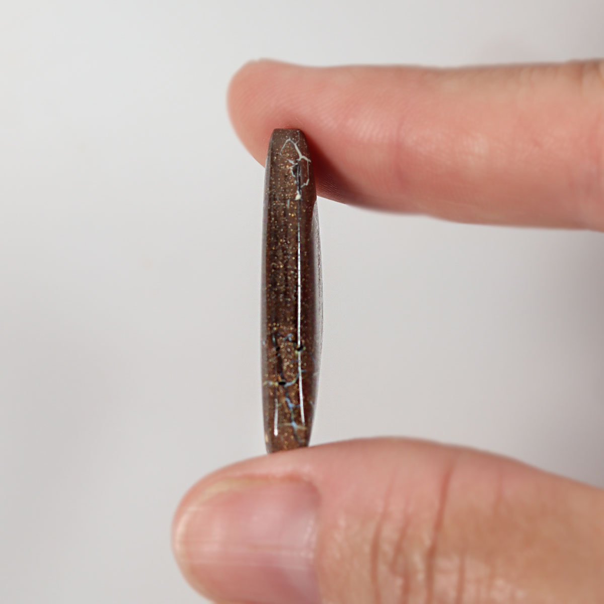 32.44ct Australian boulder matrix shown for size comparison