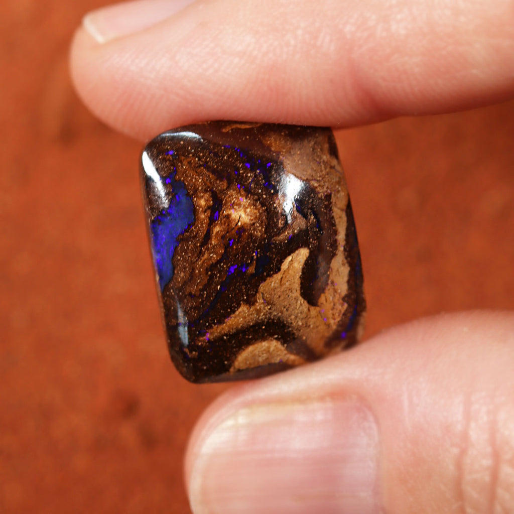 Detail of bright purple flash on boulder matrix