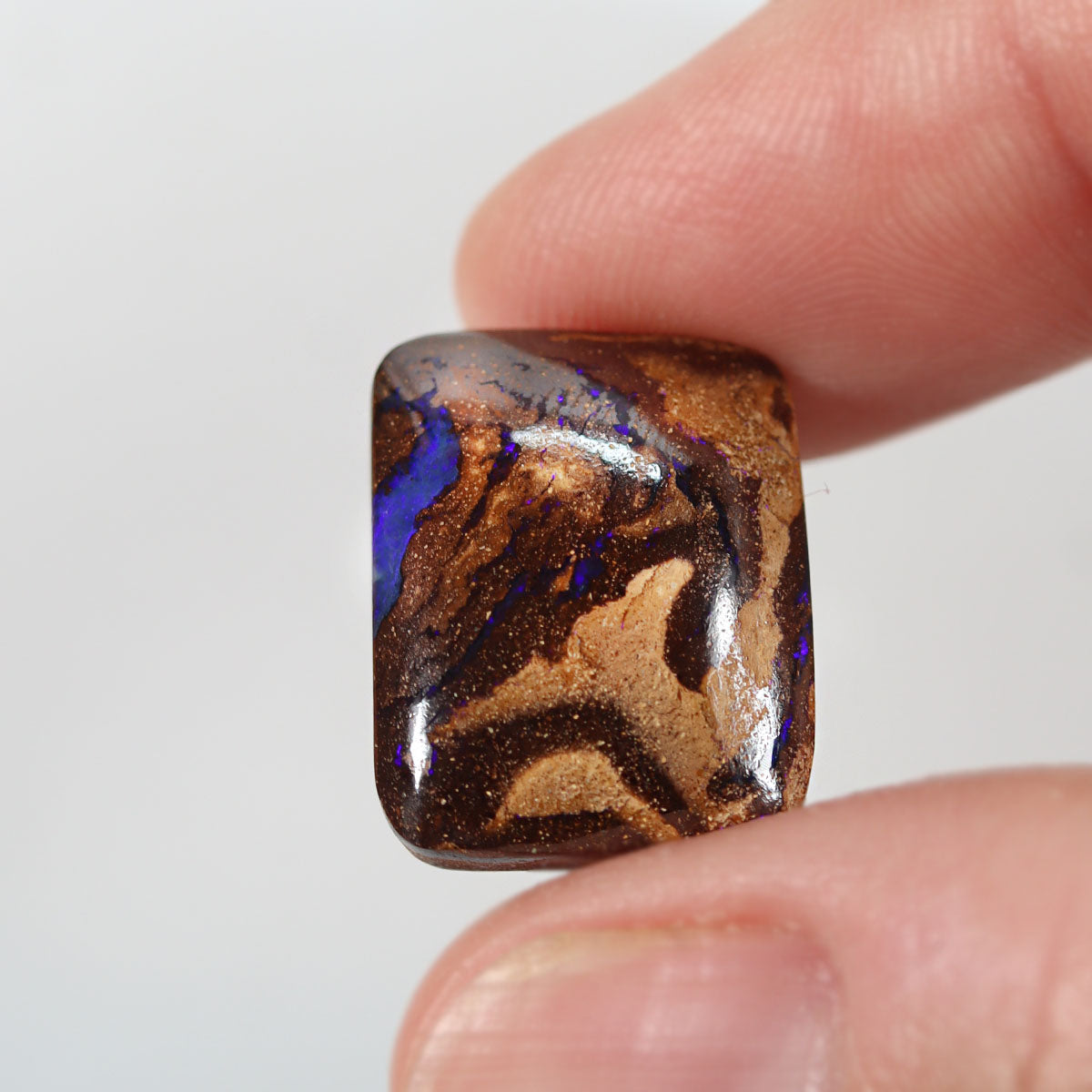 Natural boulder matrix from Opalton, 14.39ct with lively purple flash
