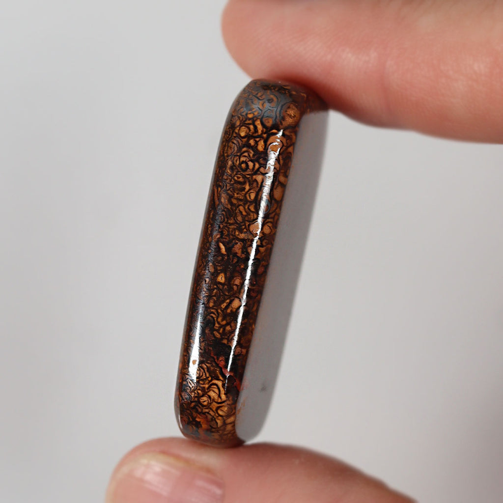 89.33ct Australian boulder matrix shown for size comparison