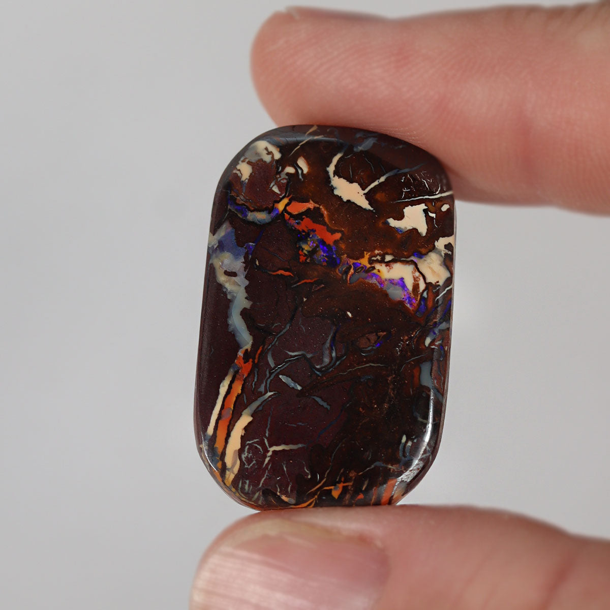 23.82ct boulder matrix from Koroit with purple boulder matrix play-of-colour