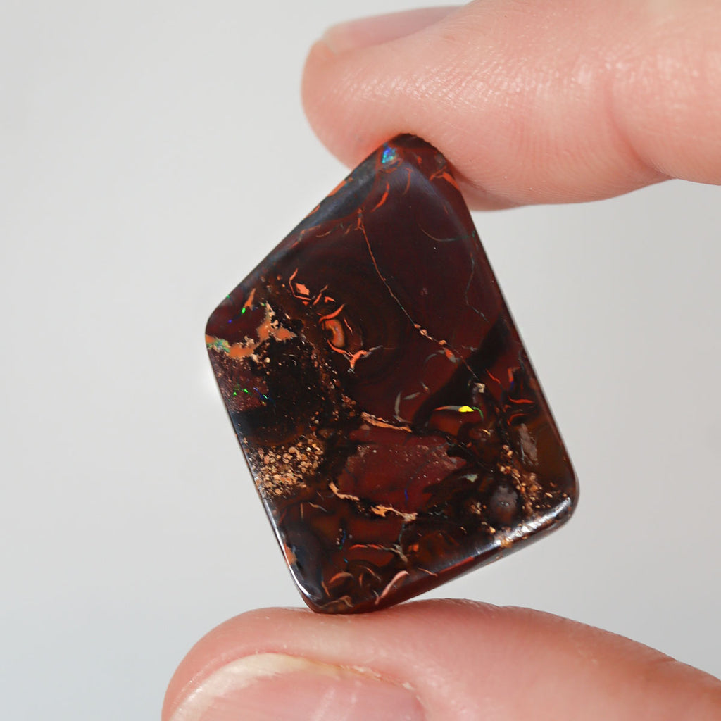 21.48ct soft purple boulder matrix cabochon with boulder matrix pattern