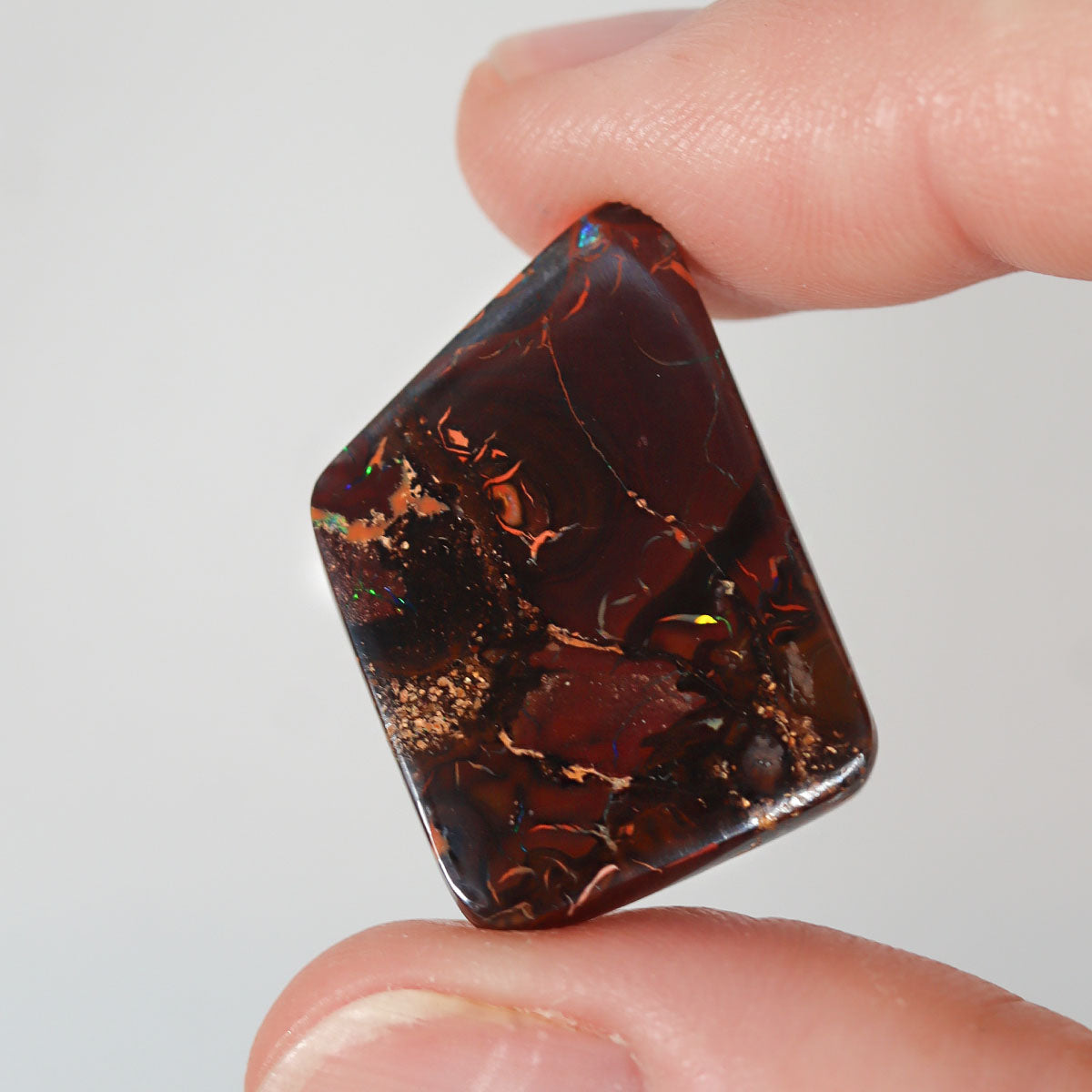 21.48ct soft purple boulder matrix cabochon with boulder matrix pattern