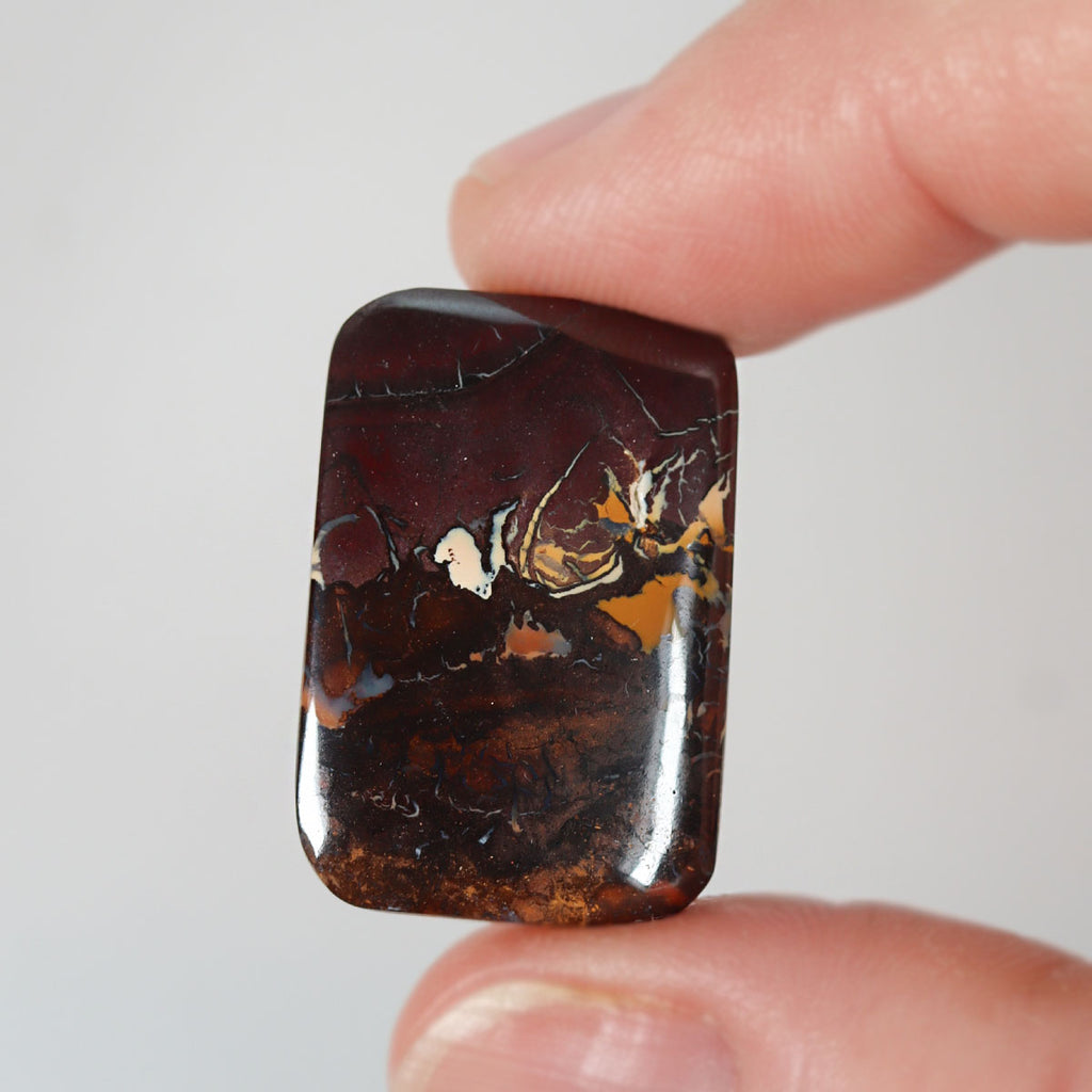 20.58ct soft purple boulder matrix cabochon with boulder matrix pattern