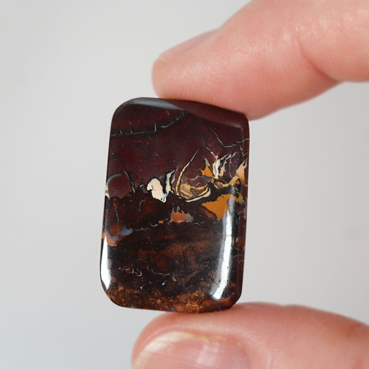 20.58ct soft purple boulder matrix cabochon with boulder matrix pattern