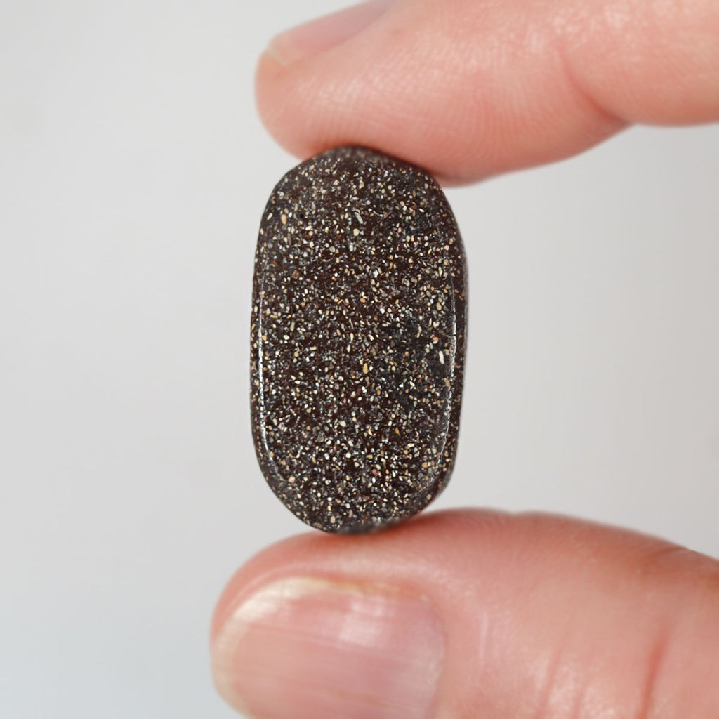 Side view of blue boulder matrix cabochon