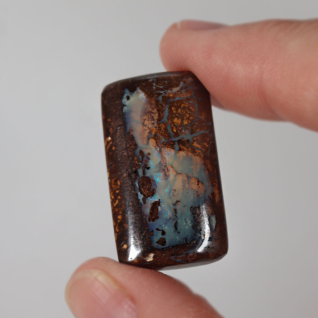 Natural boulder matrix from Koroit, 34.7ct with refined blue flash