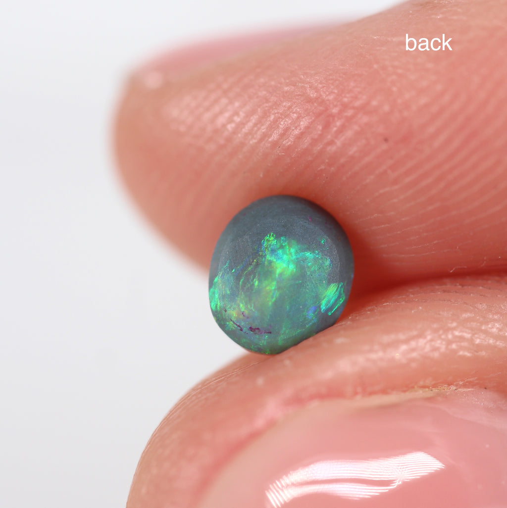 0.66ct Black Opal - 5 x 5.5 x 3.8mm