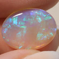 Macro detail of crystal opal cabochon