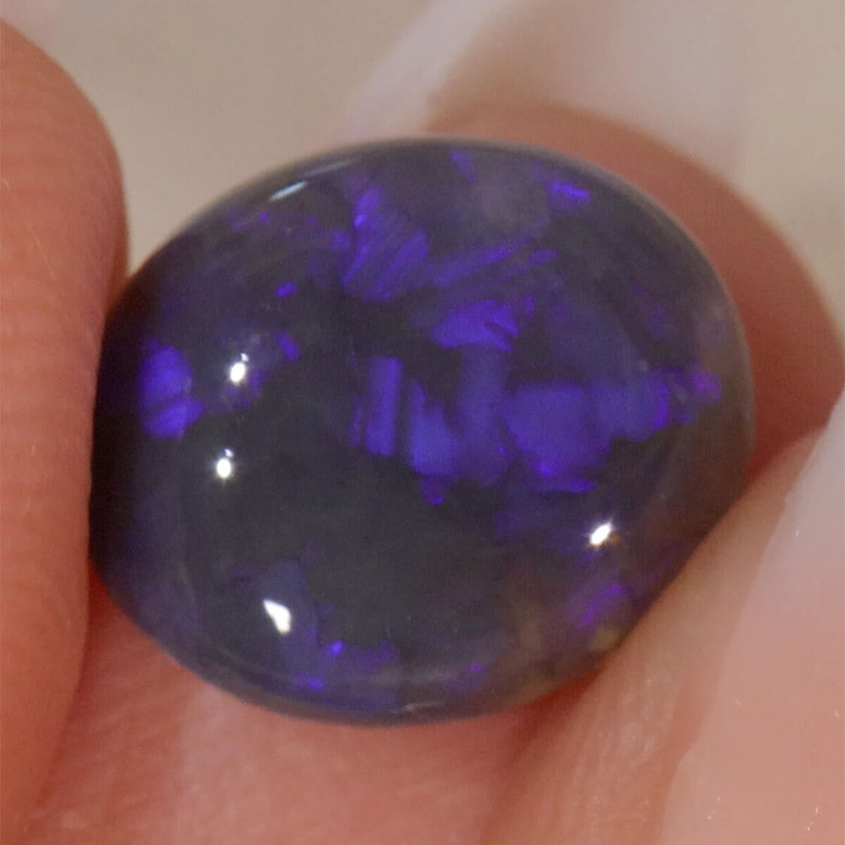 3.65ct Black Crystal Opal - 10 x 11.5 x 5mm