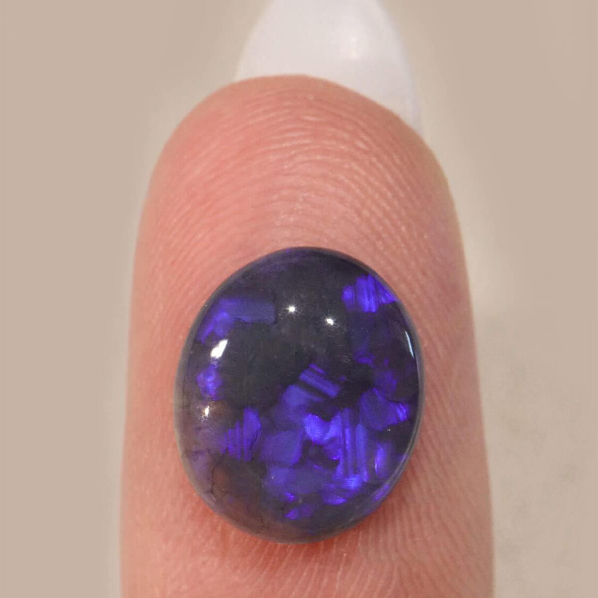 3.65ct Black Crystal Opal - 10 x 11.5 x 5mm