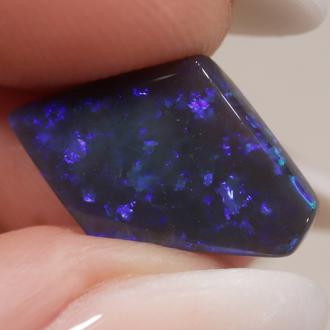 4.22ct Black Opal - 12 x 18 x 3.5mm