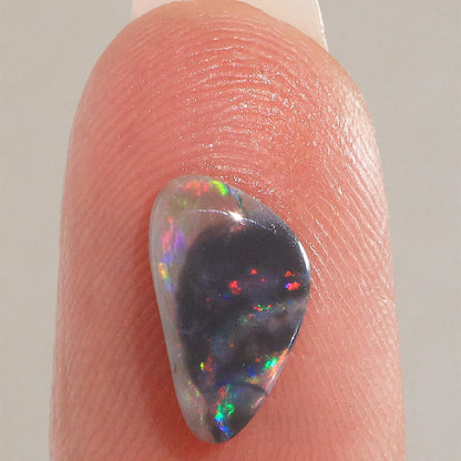 0.74ct Black Opal - 6.5 x 11 x 2mm