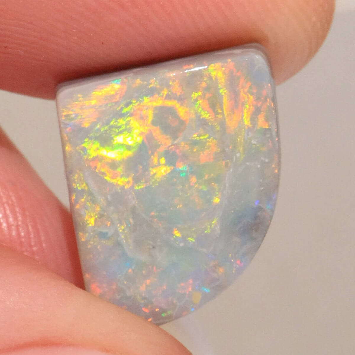 6.90ct Dark Opal - 11.5 x 13.5 x 5mm