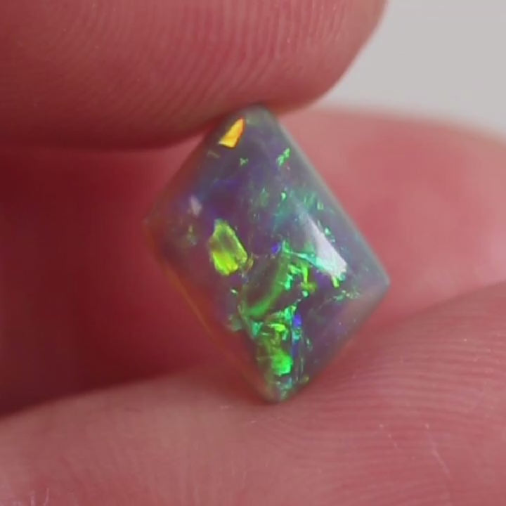 1.8ct Dark Opal - 6.6 x 8.7 x 4mm