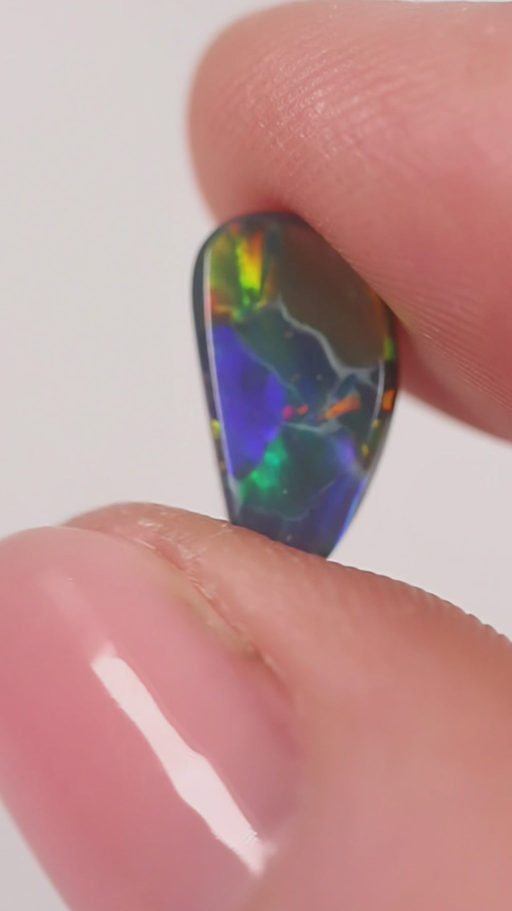 1.76ct Black Opal - 6.5 x 12 x 3.4mm