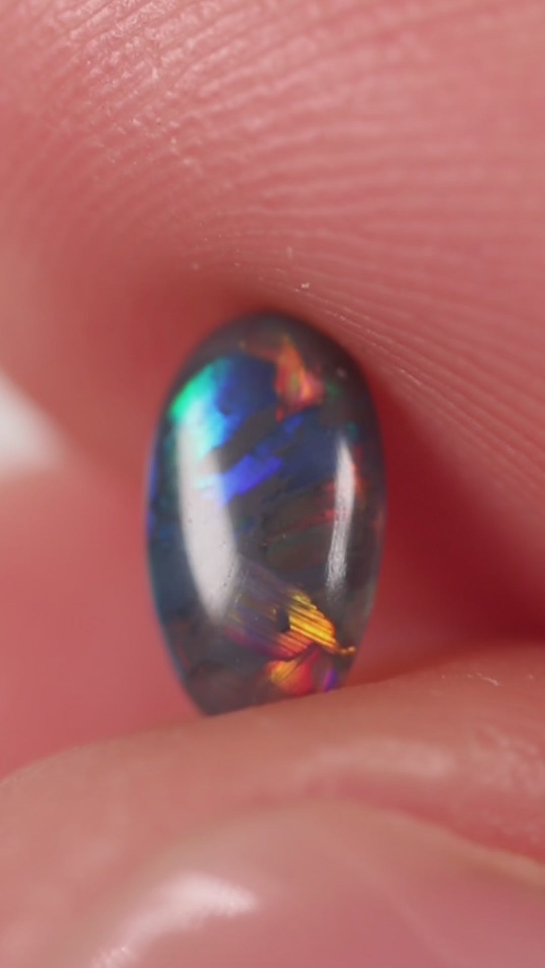 0.48ct Black Opal - 4.3 x 7.5 x 2.5mm