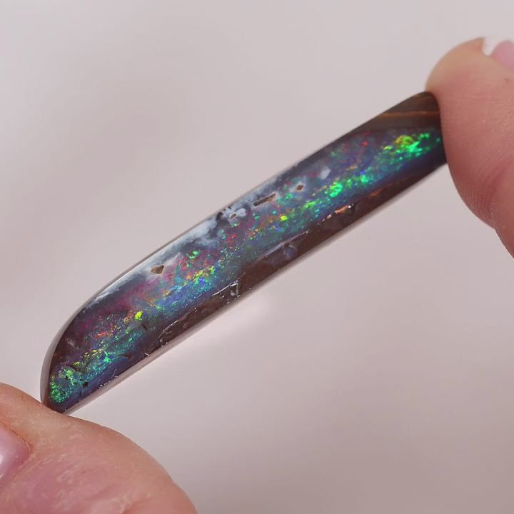 30.3ct Boulder Opal - 9.5 x 42.4 x 6.3mm