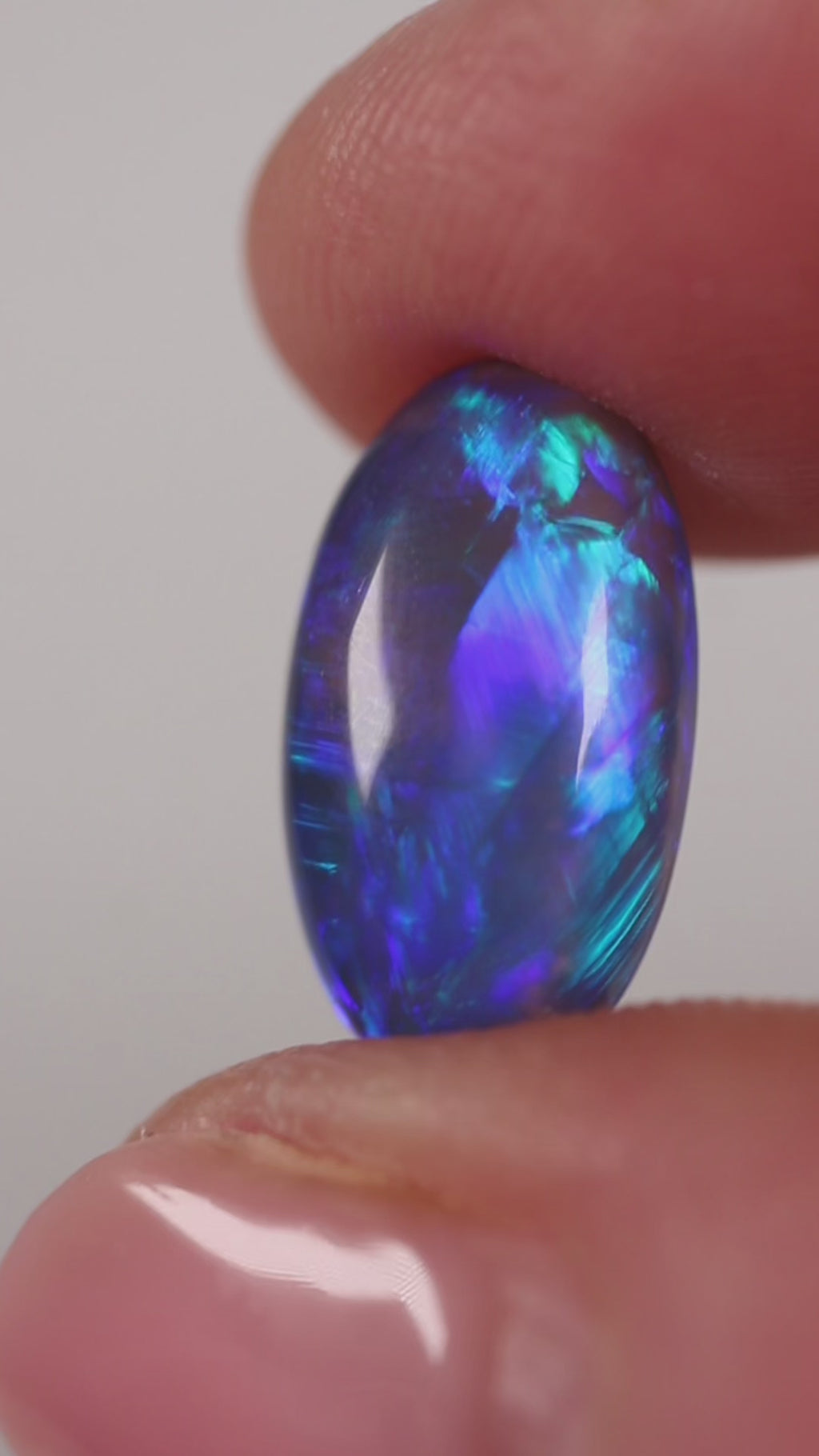 4.57ct Black Opal - 8.7 x 15.5 x 5.9mm