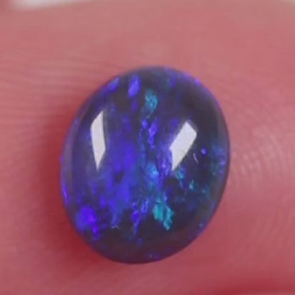 0.84 ct Black Opal - 6 x 7.2 x 3mm