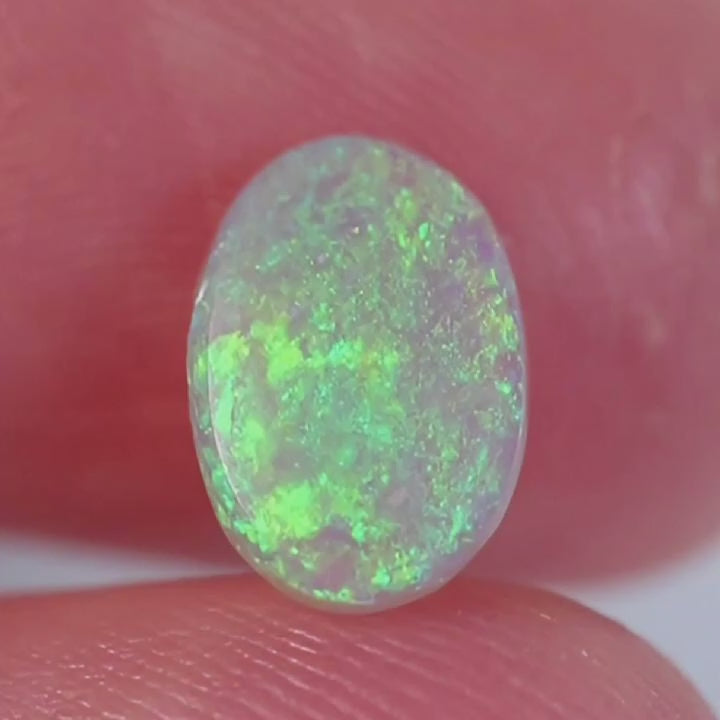 0.7ct Dark Crystal Opal - 6.2 x 9 x 1.9mm