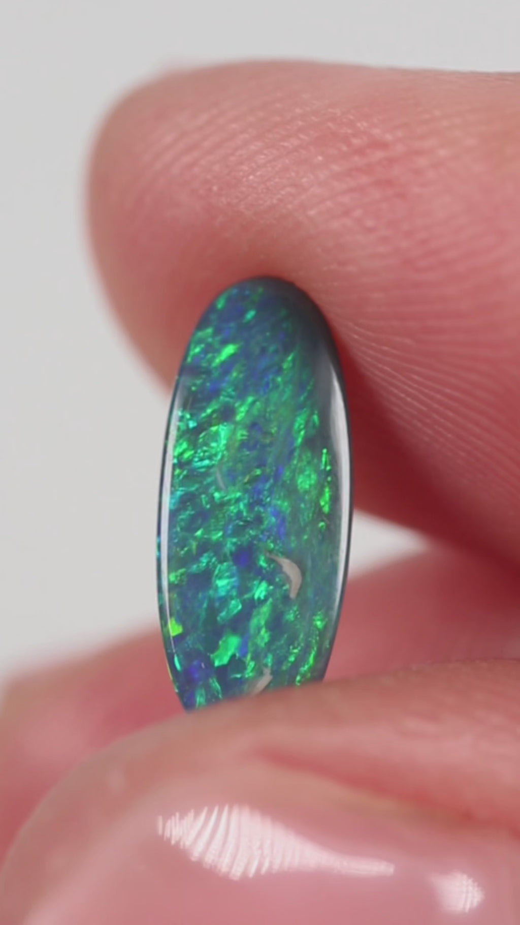1.10ct Black Opal - 5.5 x 13 x 2.2mm