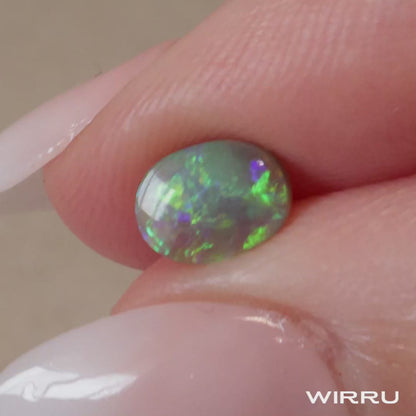 0.55ct Dark Crystal Opal - 5.5 x 7.5 x 2mm