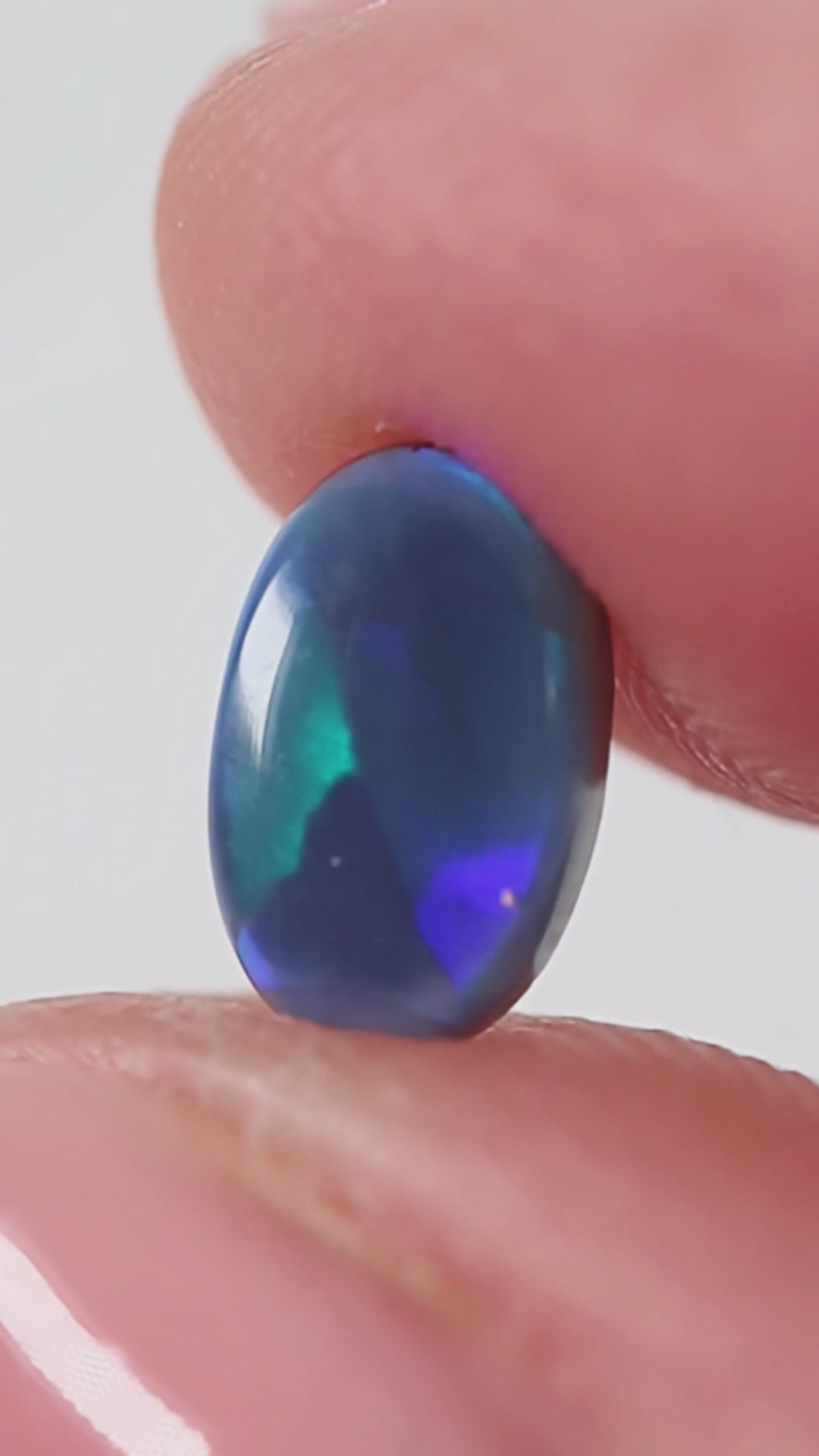 0.85ct Black Opal - 5.4 x 7.8 x 2.8mm